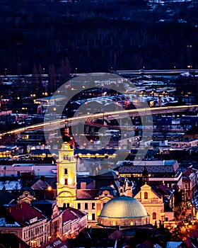Aerial night view of the Downtown Candlemas Church of the Blessed Virgin Mary in Pecs, Hungary