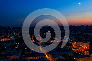 Aerial night view of old town of Lviv in Ukraine. Lvov cityscape. View from tower of Lviv town hall