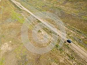 aerial off-road truck in the summer green field f