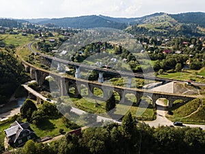 Aerial old viaduct railway crossing in Vorokhta Ukraine Carpathians