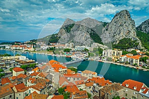 Aerial Omis cityscape with gorge and Cetina river, Dalmatia, Croatia