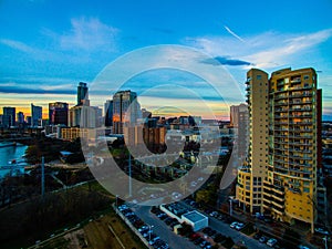 Aerial Over Austin Texas Colorful Towers and Condominiums Cityscape Skyline Sunset over Downtown