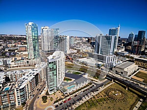 Aerial Over Austin Texas Modern Buildings and condominiums during sunny blue sky afternoon photo