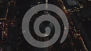 AERIAL: Over Berlin Germany TV Tower Alexanderplatz at Night with City Lights traffic