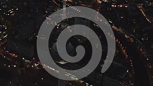 AERIAL: Over Berlin Germany TV Tower Alexanderplatz at Night with City Lights traffic