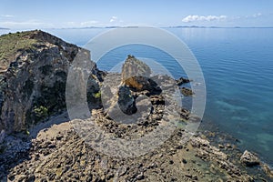 Aerial Over Small Rocky Island