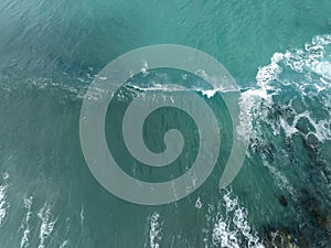 Aerial Over Surf and Rocks