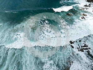 Aerial Over Surf and Rocks