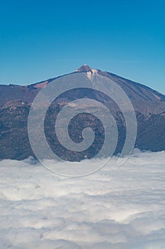 Aerial overcloud view on Tenerife island from airplane