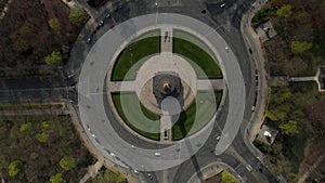 AERIAL: Overhead Birds Eye Drone View Rising over Berlin Victory Column Roundabout with Little Car Traffic during Corona