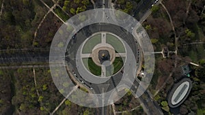 Aerial: overhead birds eye drone view rising over Berlin Victory Column Roundabout with Little Car Traffic during Corona