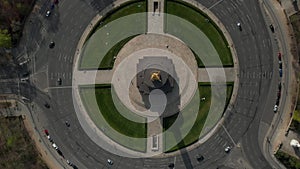 AERIAL: Overhead Birds Eye Drone View Rising over Berlin Victory Column Roundabout with Little Car Traffic during Corona