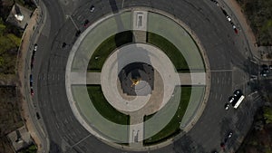 AERIAL: Overhead Birds Eye Drone View Rising over Berlin Victory Column Roundabout with Little Car Traffic during Corona