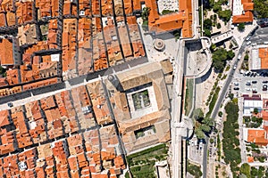 Aerial overhead drone shot of Franciscan church by Pile Gate in Dubrovnik old town in Croatia summer