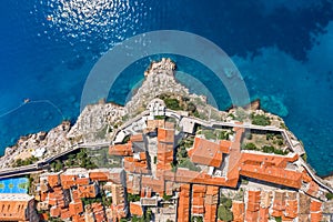 Aerial overhead drone shot of rDubrovnik old town city wall Adriatic coastline in Croatia summer