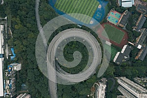 Aerial overhead shot of particular double circle 720 degree flyover in residential buildings in Chongqing, China