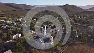 Aerial overhead small town in mountain landscape