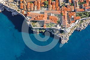 Aerial overhead view of Church of St. Marija in Dubrovnik city wall by Adriatic sea in Croatia summer