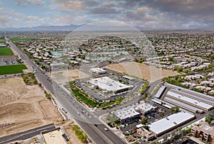 Aerial overlooking desert small town a Avondale city of beautiful highway Arizona on the mountain with traffic line in Interstate photo