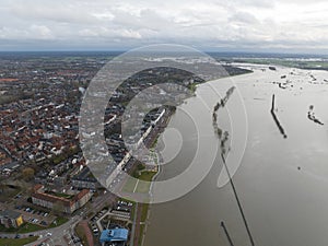 Aerial overview of the city of Zutphen, along the river Ijssel in Gelderland, The Netherlands. Birds eye aerial drone