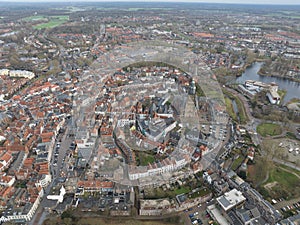 Aerial overview of the city of Zutphen, along the river Ijssel in Gelderland, The Netherlands. Birds eye aerial drone