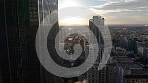 Aerial pan between downtown Los Angeles LA street, California Plasa, Financial District