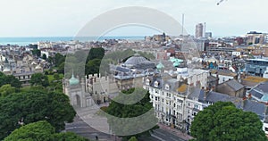 Aerial panning view of the town of Brighton and Hove, England. Around the Royal Pavilion and the Dome
