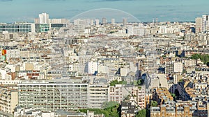 Aerial panorama above houses rooftops in a Paris timelapse