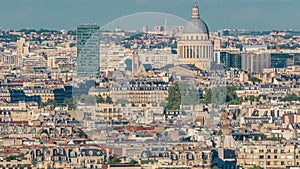 Aerial panorama above many houses rooftops in a Paris timelapse