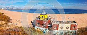 Aerial panorama of the beautiful beach with lifeguards house at Baltic Sea in Gdansk, Poland