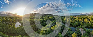 Aerial panorama of Cairns Botanical garden at sunset showing the rainforrest