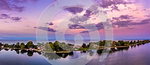 Aerial panorama of the Ceder Point peninsula at dusk