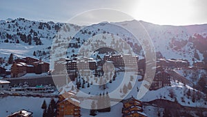 Aerial panorama of Chalets in the Meribel village, on the top of the valley in the french Alps. Visible houses and condominiums