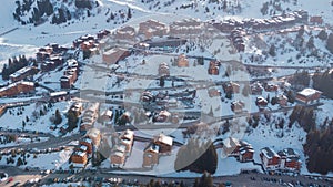 Aerial panorama of Chalets in the Meribel village, on the top of the valley in the french Alps. Visible houses and condominiums