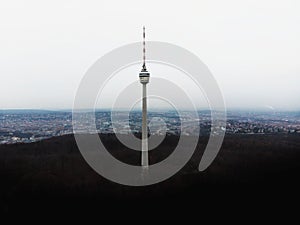 Aerial panorama of concrete communications TV tower Fernsehturm overlooking city of Stuttgart Baden Wurttemberg Germany