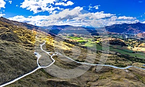 Aerial Panorama of The Coronet Peak and Skippers Road entrance. Arrowtown in the background