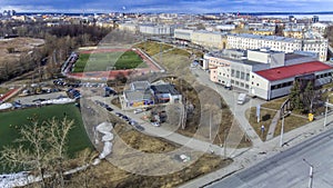 Aerial panorama of downtown with avenues and stadium