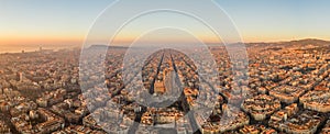 Aerial panorama drone shot of Barcelona city church in construction in sunrise hour in Spain winter