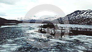 Aerial panorama drone view of beautiful Lofoten Islands winter scenery with ice floes. Lofoten Islands, Norway