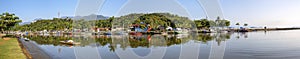 Aerial panorama of estuary of river Pereque and area Pontal with mirror reflections of morning sun in Unesco World Heritage