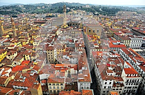 Aerial panorama of Florence old town from the top of Florence Cathedral Il Duomo di Firenze with a view of crowded houses