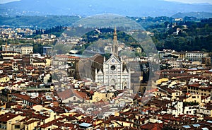 Aerial panorama of Florence old town from the top of Florence Cathedral Il Duomo di Firenze with a view of crowded houses