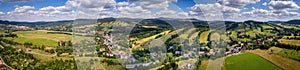 Aerial panorama of Gluszyca, Sowie mountains in background