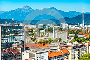 Aerial panorama of Ljubljana with modern buildings and the Alps in the background, Slovenia