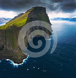 Aerial panorama of massive cliffs of Kalsoy on Faroe Islands