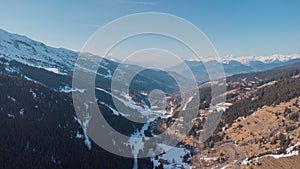 Aerial panorama of Meribel village, on the end of the valley in the french Alps. Beautiful panorama of ski slopes and chalets with