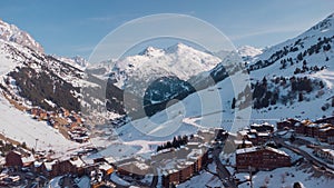 Aerial panorama of Meribel village, on the end of the valley in the french Alps. Beautiful panorama of ski slopes and chalets with