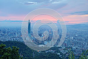 Aerial panorama of overpopulated Taipei City at dusk
