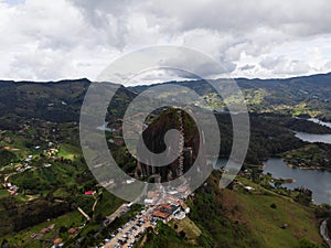 Aerial panorama of Piedra Del Penol El Penon de Guatape rock stone inselberg monolith granite dome in Antioquia Colombia