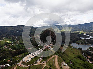 Aerial panorama of Piedra Del Penol El Penon de Guatape rock stone inselberg monolith granite dome in Antioquia Colombia photo